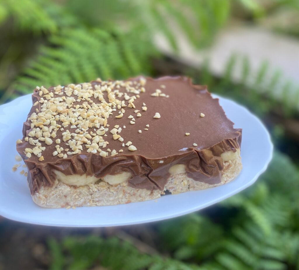 banana chocolate cake on a white plate