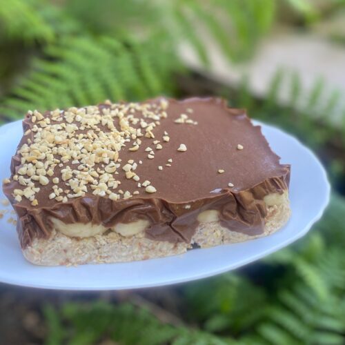 banana chocolate cake on a white plate