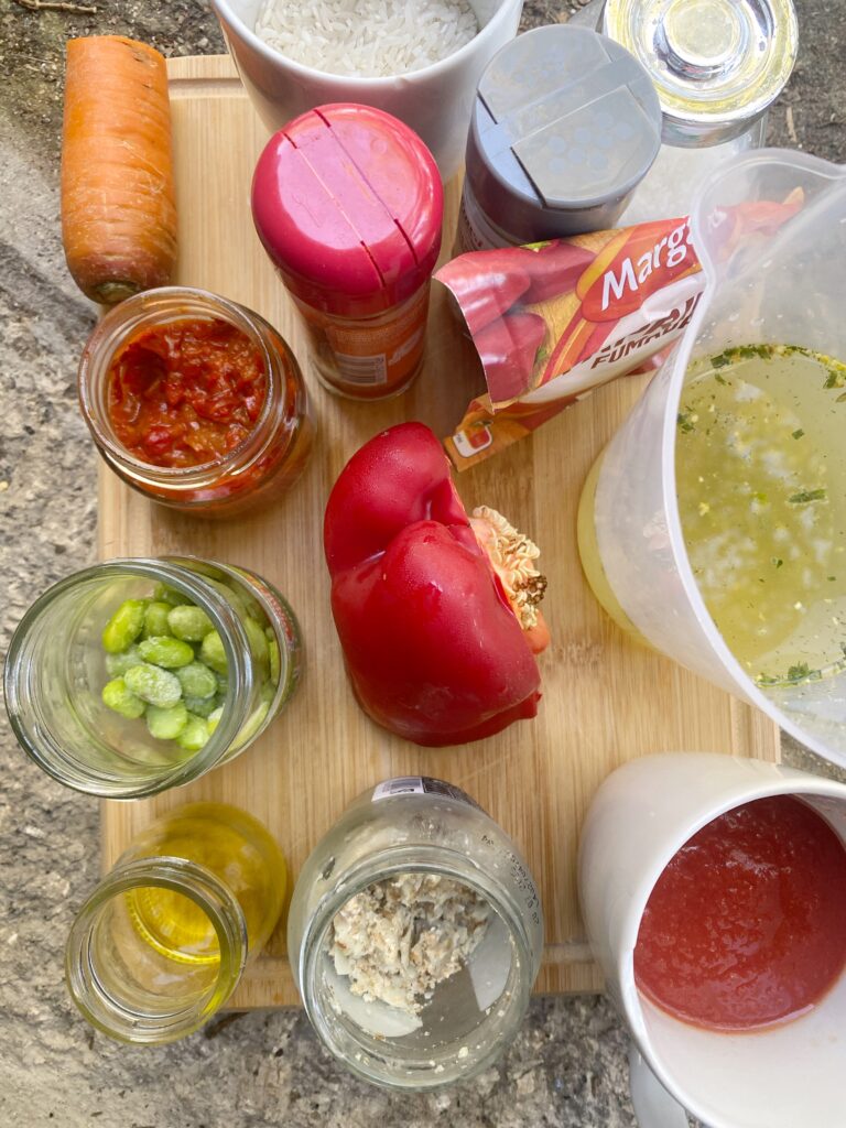 ingredients for djuvec rice, on a wooden board