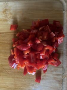 peppers cut on a wooden board