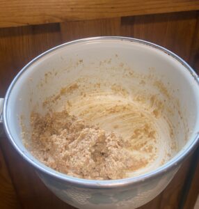 ground walnuts and plant milk in a saucepan