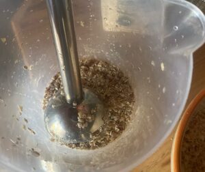 dates and oats being blended