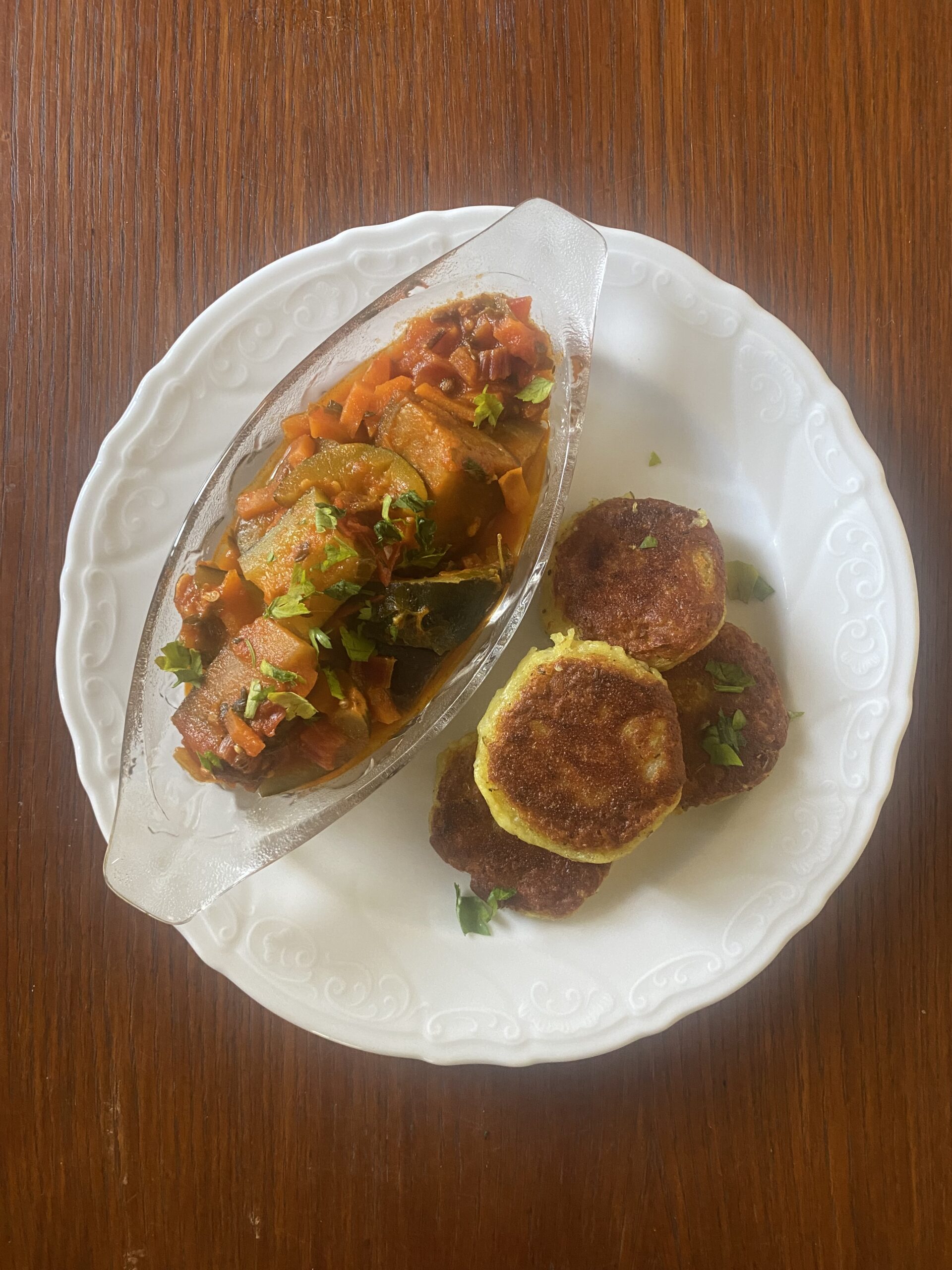 Potato mash patties with aubergine tomato stew